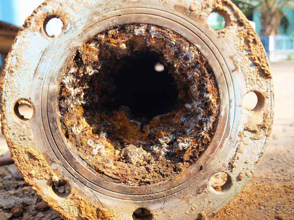 commercial pipes in need of cleaning