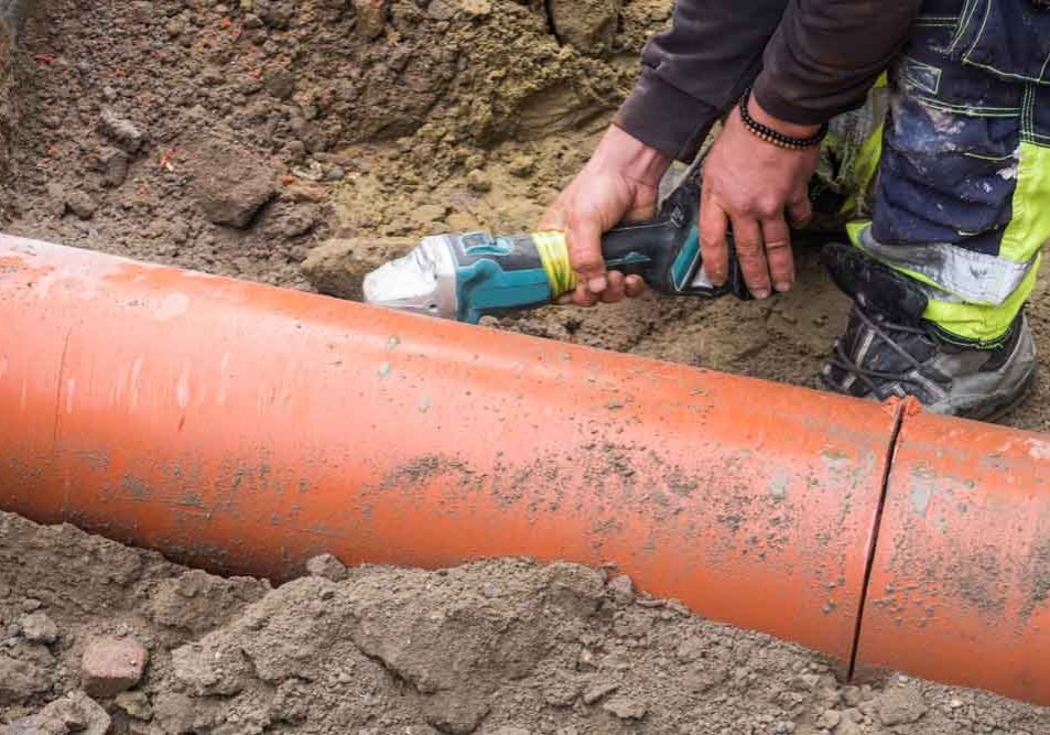 technicians repairing a sewer line Seattle, WA